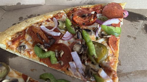 Vegan Toppers Classic with additional toppings: garlic-roasted tomatoes and fire-roasted jalapeños   at Toppers Pizza - South Blvd in Charlotte