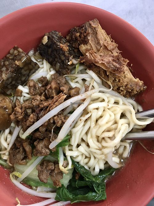 Sesame noodles with some extra mock meats offered to me by another customer who insisted that they’re delicious and a must-try!  at Sān Yuán Zhāi 三元齋 in Tainan