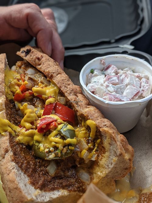 Oki dawg with gluten free bun, and potato salad. Pretty spicy 🥵 at Fatty Vegan in Ventura