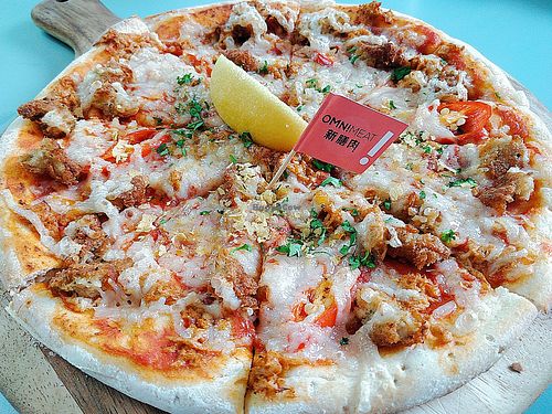 Omni Tuna & Crab Pizza. not great. the vegan cheese is dry.  at Green Common 绿客门 in Central Singapore