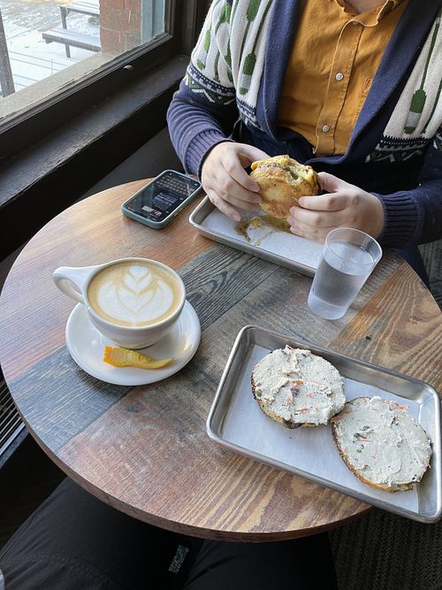 Vegan breakfast sandwich & “lox” shmear, and rosemary maple latte  at Coat Check Coffee in Indianapolis