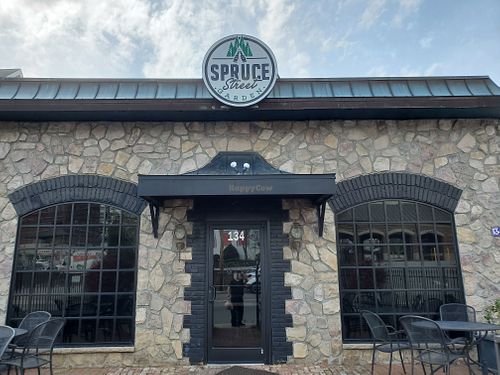 Yes this is Doms, you're in the right spot. Go in.  To the right,  and to the back.  You've found great food..Rad at Dom's in Winston-salem