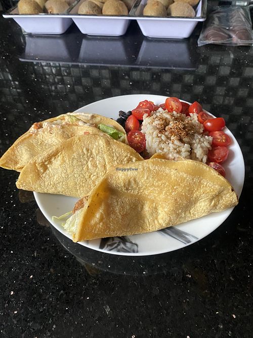 Remaining vegan order enjoyed at home w/beans + rice and lots of grape tomatoes  at Más Veggies Taqueria in Corte Madera