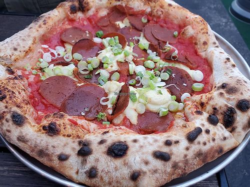 AMERICANA

Mozzarella, tomato sauce, "BE-Hive" pepperoni, green onion at Pura Vita in Redondo Beach