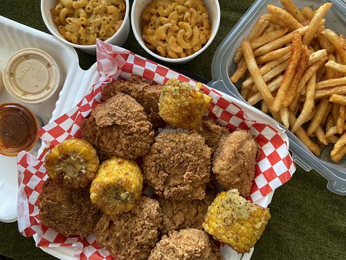 Family chicken bucket with Cajun fries and mac&cheese   at Don't be Chick'n in San Jose