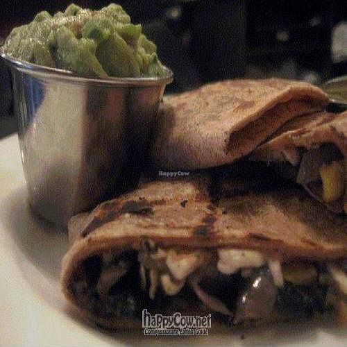 Quesadilla appetizer at Candle Cafe NYC, with a side of guacomole. at Candle Cafe in New York City
