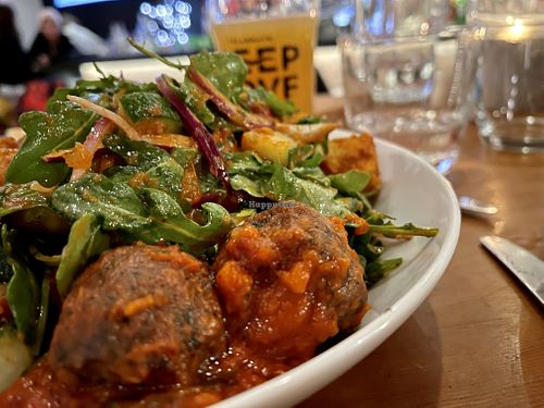 Salad w meatballs at Cure Lounge & Patio in Whistler