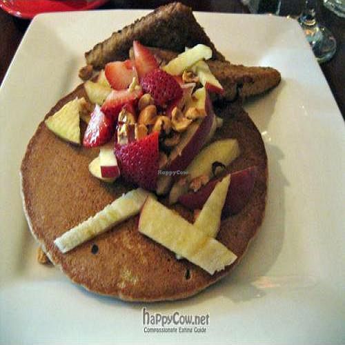 Country Breakfast Platter with Two berry-spelt pancakes, fresh fruit, marinated tempeh. at Caravan of Dreams in New York City