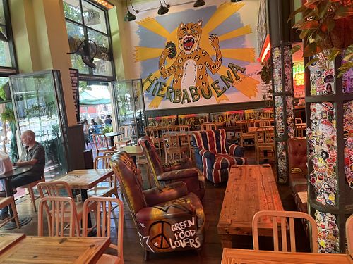 Indoor and outdoor seating   at Hierbabuena Vegan in Buenos Aires