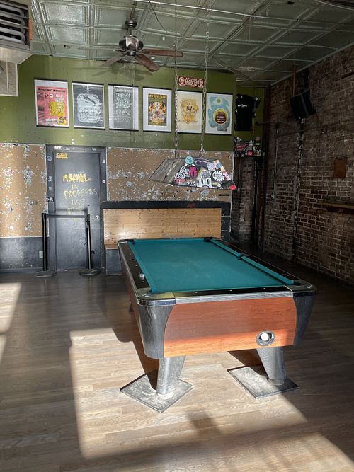 Pool table attached to pizza friend pizza and bar next door,  all same ownership  at Pizza Friendly Pizza in Chicago