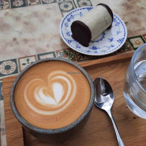 Oat latte and marzipan log at Fraa.kost in Norwich