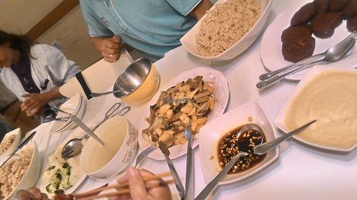 Stir fried veges with Spanish traditional dishes at Loving Hut in Madrid