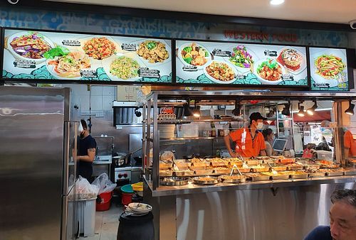 Stall front. 
Photo by Sam Lama at Vegetarian Century 素时代 in Central Singapore