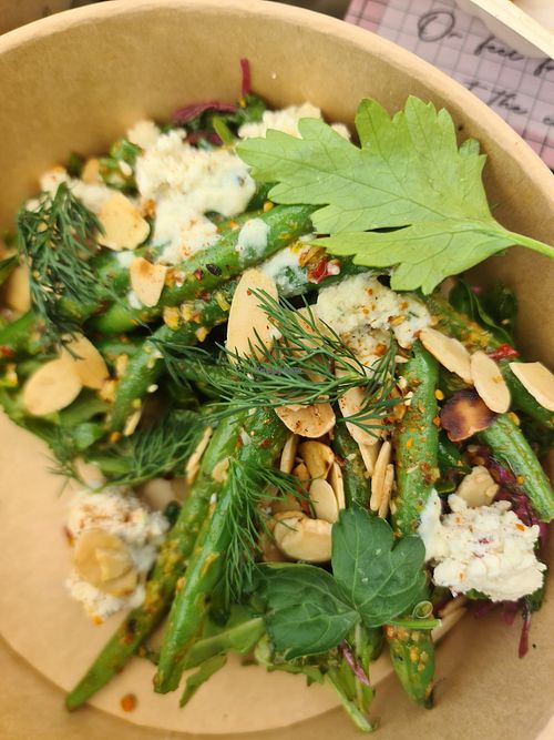 Green beans with chilli  garlic, toasted almonds, Yay! Feta  lemon and herb dressing at Twinkle Town  in Port Douglas