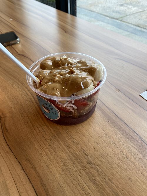 Delicious açaí bowl with peanut butter   at Bare Naked Bowl in East Meadow