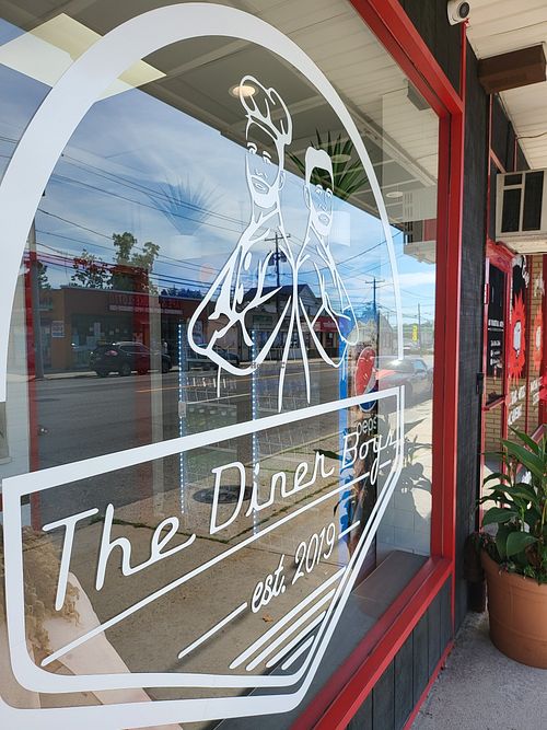 Front window at The Diner Boys in Merrick