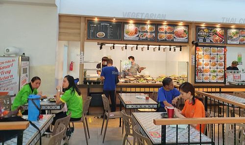 Stall front and coffee shop interior. Photo by Sam Lama at Vegan Craft 艺素蔬品 in Northeast Singapore