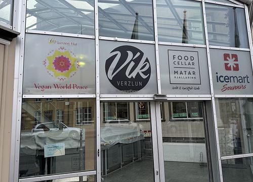 Small sign outside on front door    at Vegan World Peace by Loving Hut in Reykjavik