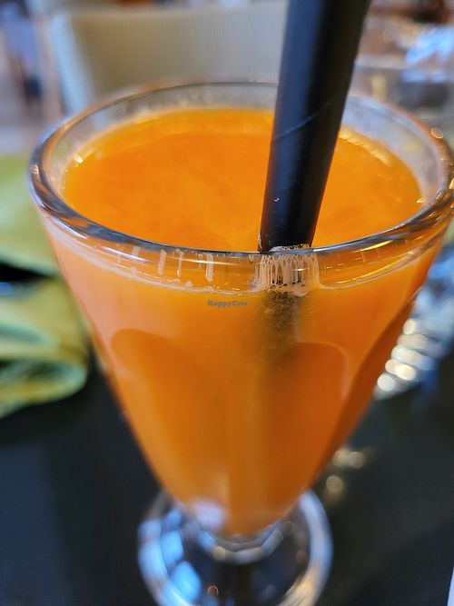Carrot orange fresh juice at Vegan World Peace by Loving Hut in Reykjavik