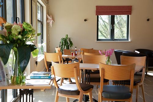 Comfortable seating with woodburner. at On The Brook in Bruton