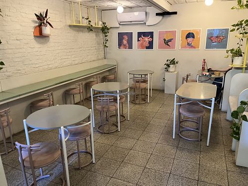 Indoor seating — with outlets  at Bioma in Buenos Aires