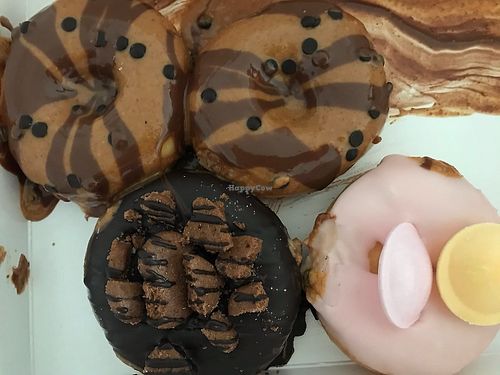 Schokocreme (left), peanutbutter chocolate (right), unfilled (bottom) at Royal Donuts in Leipzig