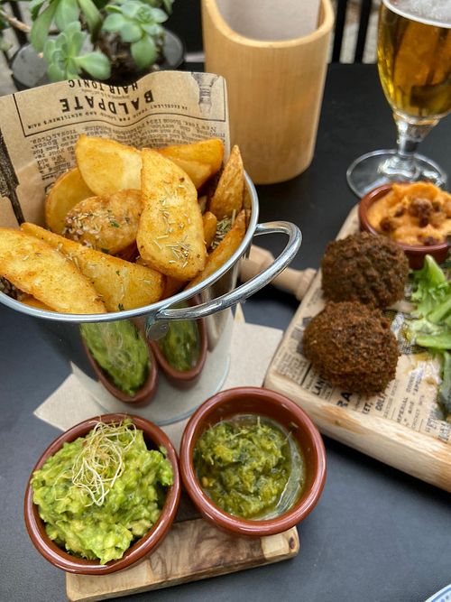 Rosemary fries and the modified vegan oriental mezze.  at Café Boho  in Mallorca