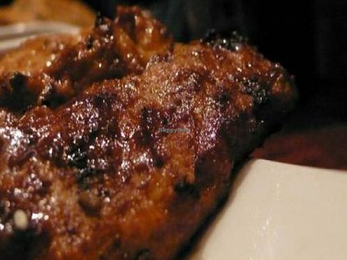 voodoo sticks: grilled soy beef and pepper kabobs served with rice and steamed vegetables at Red Bamboo in New York City