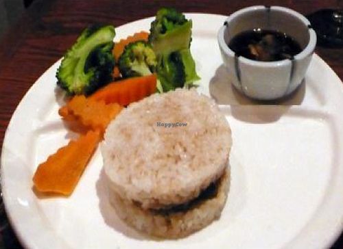 rice patty appetizer with vegetables and dipping sauce at Red Bamboo in New York City
