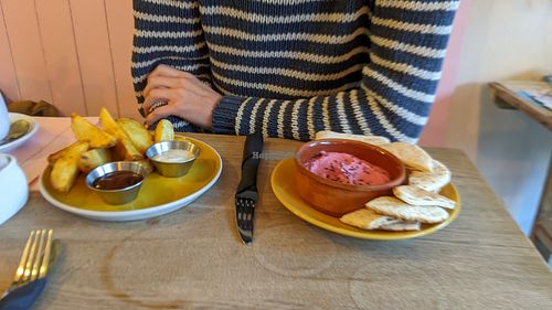 Beetroot humus + pitta and potatoe wedges at Vibes in Dorchester