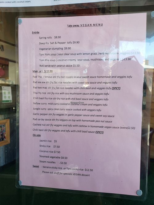 Menu on front window at Rusty Iron in Queenstown