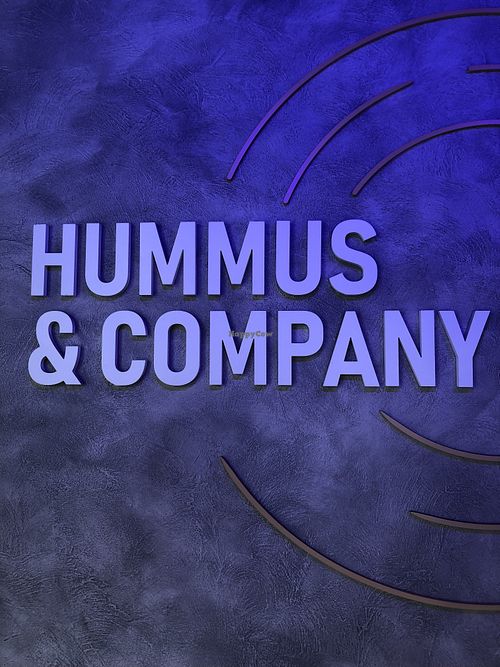 The logo  at Hummus and Company in Barcelona