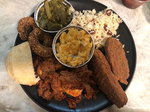 Shrimp, rib tips, tenders, rice, greens, Mac, roll at Karelyns Vegan Soul Café in Orlando