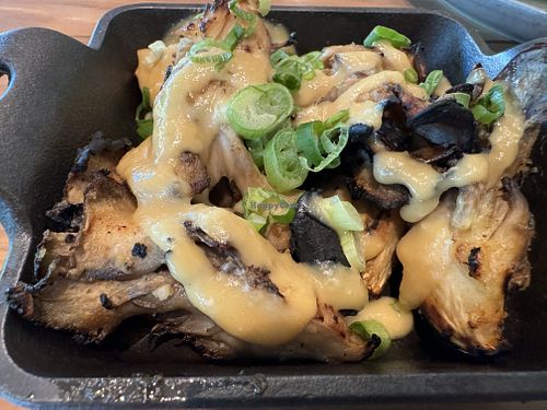 MAGIC MUSHROOMS V 🌱 grilled maitake mushrooms, miso-garlic dressing, scallion  at Flamingo's Lazeaway Club in Santa Rosa