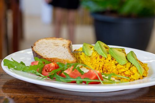Tofu scramble with avocado and Slice of on Sourdough Bread. at Nang Sabai Cafe Artisan Bakery in Koh Samui