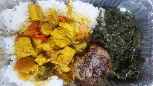Tofu vegan curry, white rice, sukuma wiki, faux meat at Soul Veg(etária)  in Nairobi