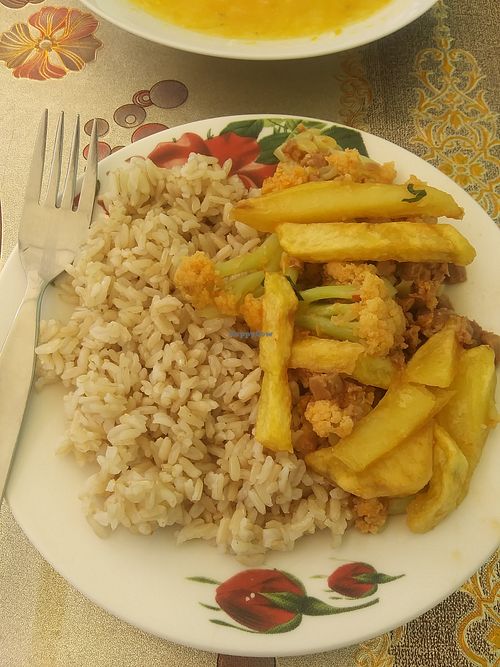 Brown rice, french fries and cauliflower dish at Las Mercedes in Trujillo