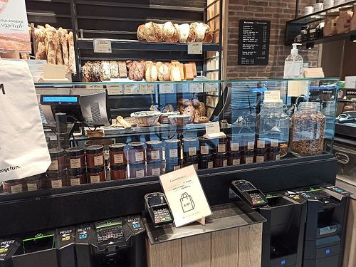 
the cashier at Land & Monkeys - Pernety in Paris