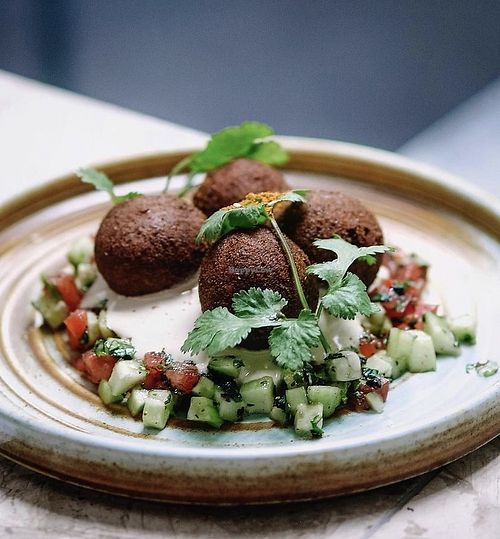 Falafel with fresh vegetables and tahini. Photo by Israel Grill at Israel Grill in Krasnodar
