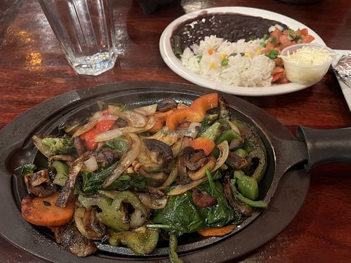 Vegan Fajitas with rice, beans and vegan 🌱 cheese  at Plaza Azteca in Methuen