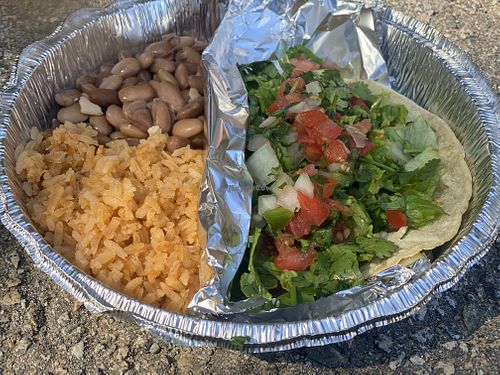Soy asada taco with lettuce, cilantro and pico de gallo, vegan rice and pinto beans  at Santiago's Taco Shop in Lake Arrowhead