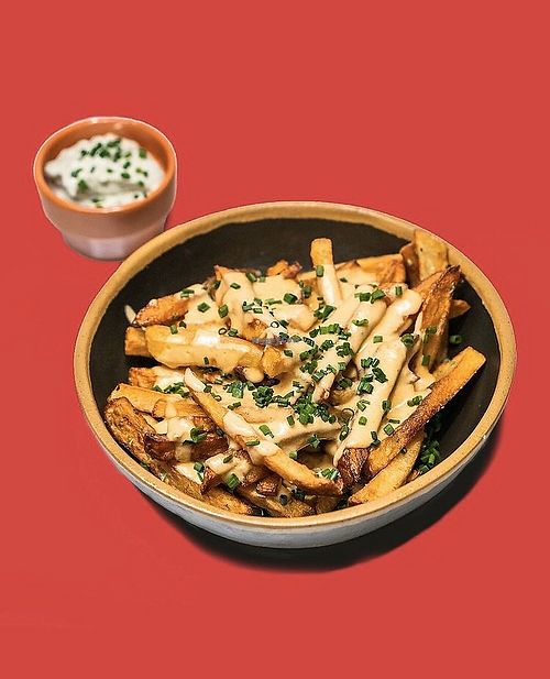 Cheesy fries  at Nosh in Lisbon