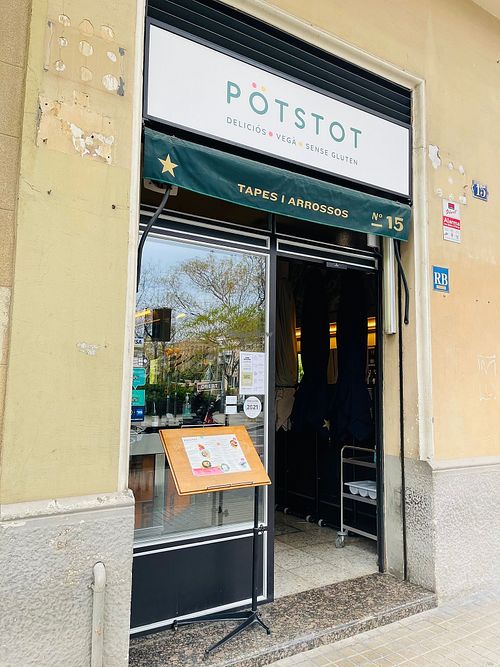 Front door with bar and terrace at PÖTSTOT in Barcelona