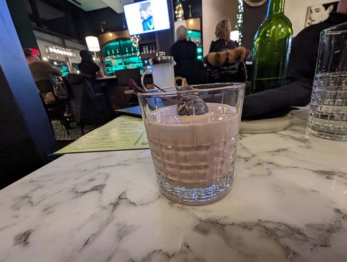 Smoked French press coffee cocktail with vegan cream at Bistro 1907 by Mark Canzonetta in Youngstown