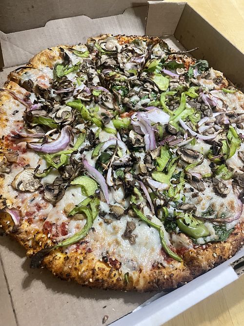 Vegan cheese with mushrooms, peppers, onion, and spinach   at Pizzava in Carson City