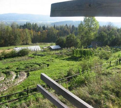 View of circular veggie garden & spiral herb garden  at EcoVillage Bhrugu Aranya in Jordanow