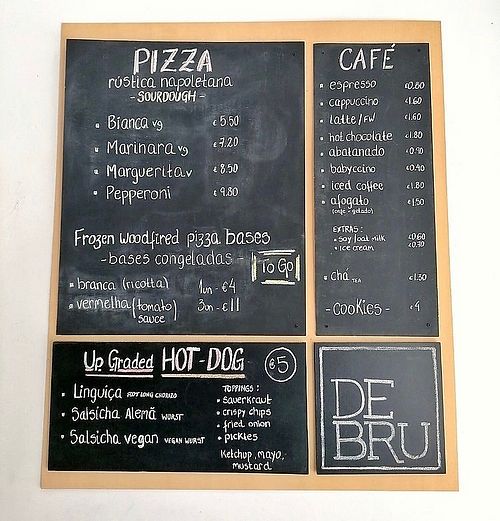 Menu with vegan pizza and hot dog at DeBru in Lisbon