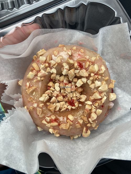 Glazed donut with peanuts and raspberry drizzle  at Mountain Donuts in South Ogden