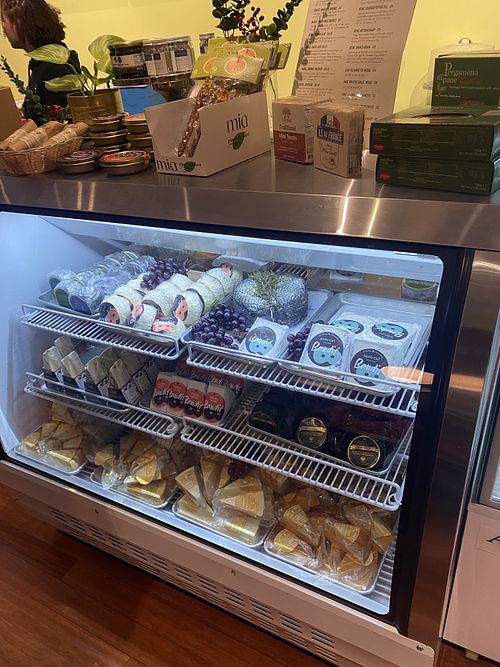 Upstairs Area w/Vegan Cheeses and Foods for Take Away  at DC Vegan in Washington