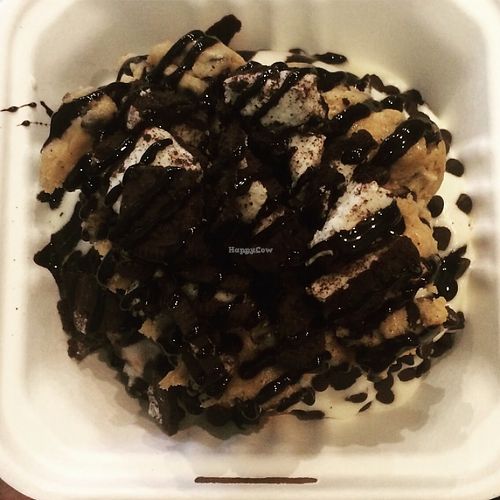 Cinnamon roll topped with chocolate chips, cookie dough & fudge sauce at Cinnaholic in Berkeley